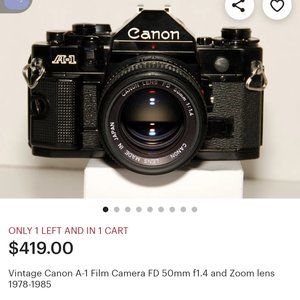 1978 -1985 vintage Canon with 50mm zoom lenz